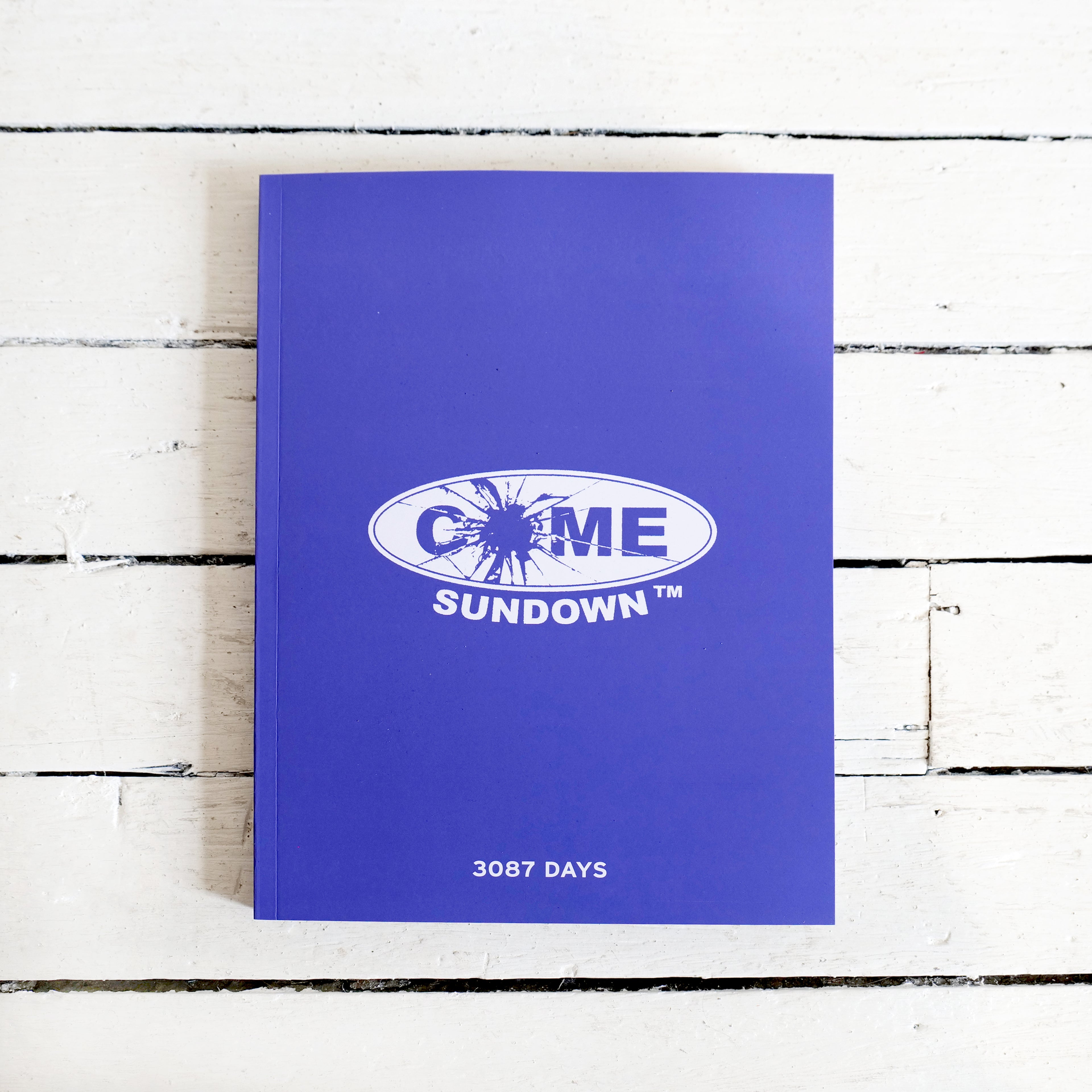 COME SUNDOWN 10 YEAR ARCHIVE BOOK