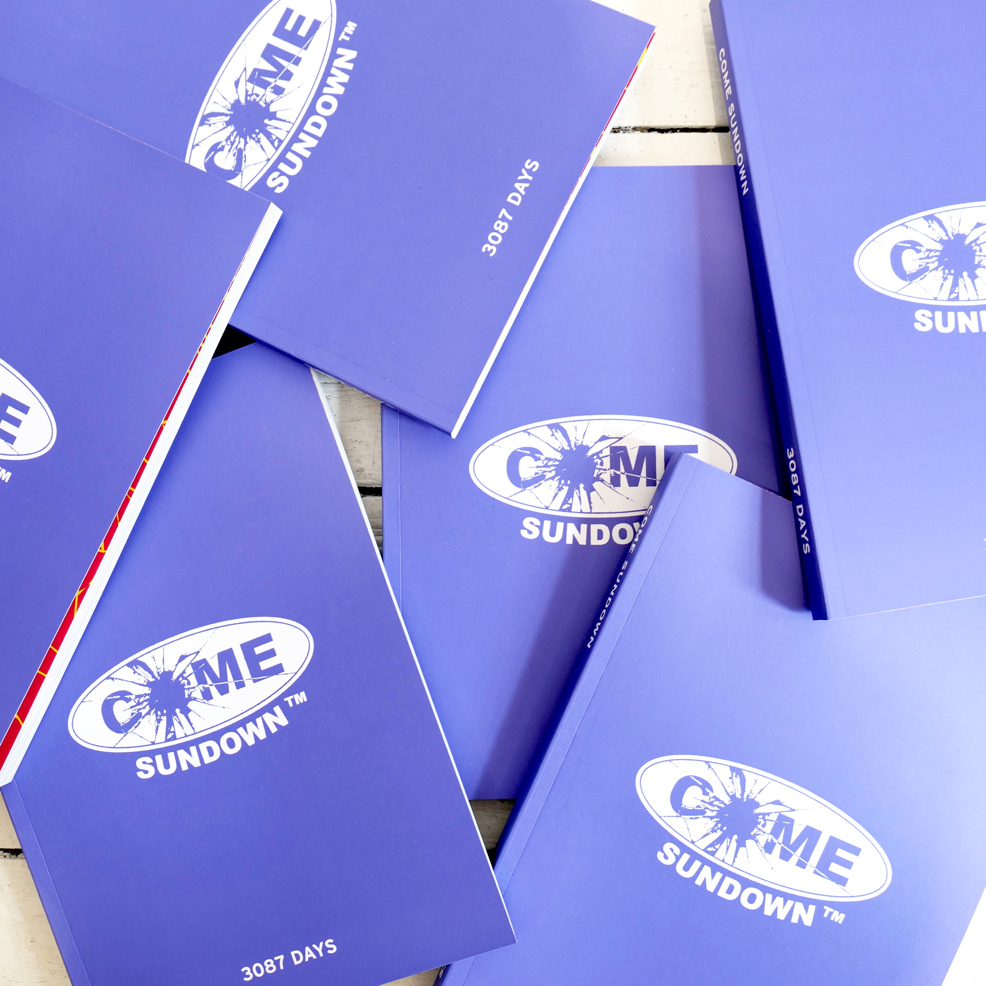 COME SUNDOWN 10 YEAR ARCHIVE BOOK